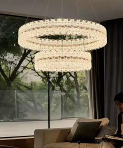 chandelier features two parallel rings adorned with diamond-cut crystal glass