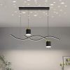 This Mega Lighting modern pendant light features sleek black wave-shaped LED strips and cylindrical spotlight accents